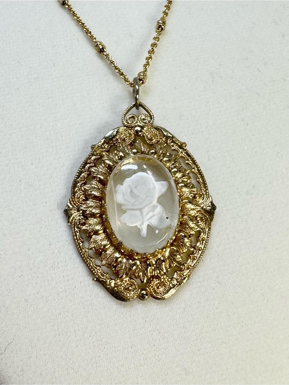 Gold Cameo Pendant Necklace with White Rose in Pendant